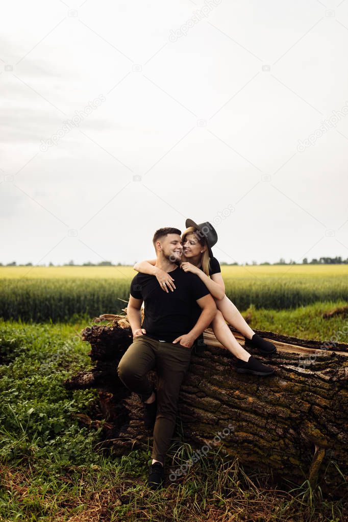 Beautiful young couple hugging outdoors