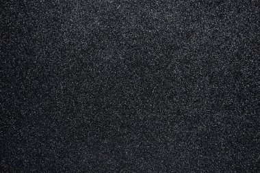 Siyah arka plan zımpara ile doku sunu, yakın çekim için soyut