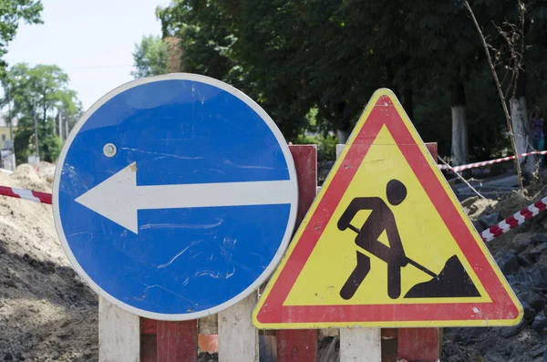 Road in repair. Signs, transportation. Road repair signs.