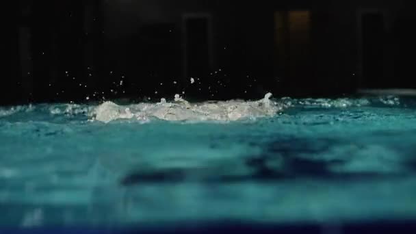 Swimmer performing butterfly stroke. Slowmo — Stock Video