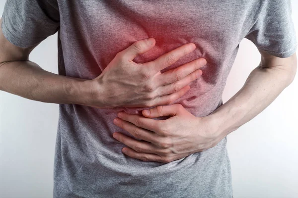Concept Heartburn Man Holds His Chest Acid Esophagus — Stock Photo, Image
