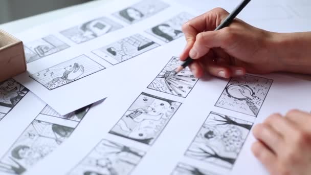 Handen Van Kunstenaar Ontwerper Tekenen Een Storyboard Papier Verhalen Vertellen — Stockvideo