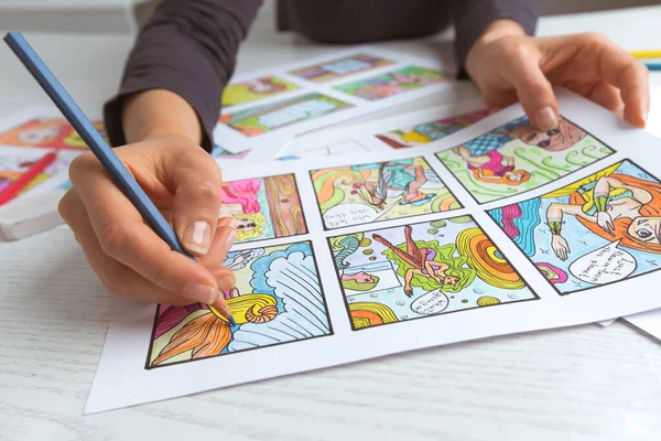 Artist animator draws a color storyboard. Sketches of illustrations for comics or cartoon.