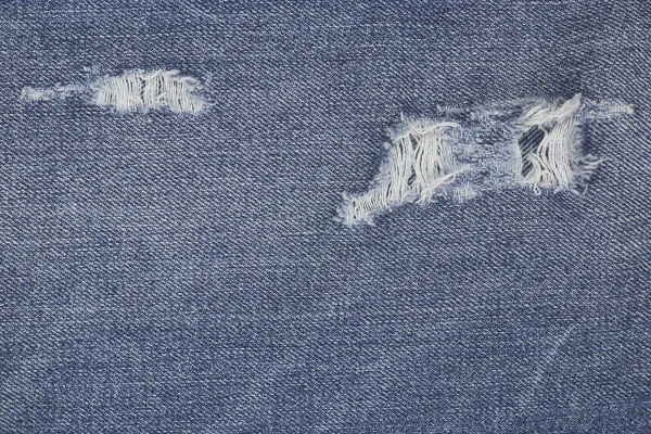 Kot mavi kot doku sökük. Soyut arka plan soluk kot pantolon. Tasarım için arka plan.