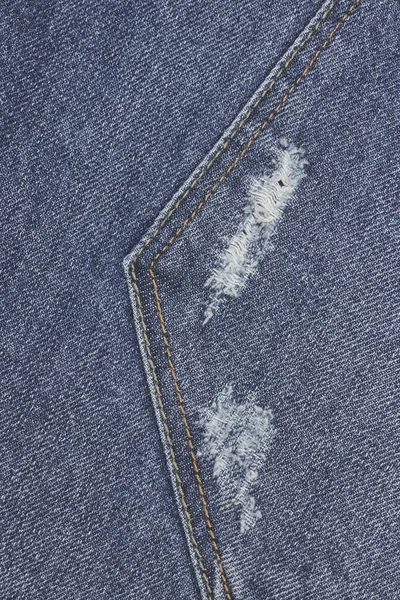 Tessitura jeans blu strappato denim. Sfondo astratto jeans sbiaditi. sfondo per il design . — Foto Stock