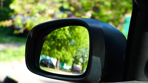 Reflection in the mirror of the car