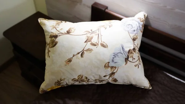 Fountain pillow on the bed