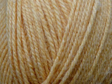 Yün skein iş parçacığının elişi gri arka plan doku fiber makro