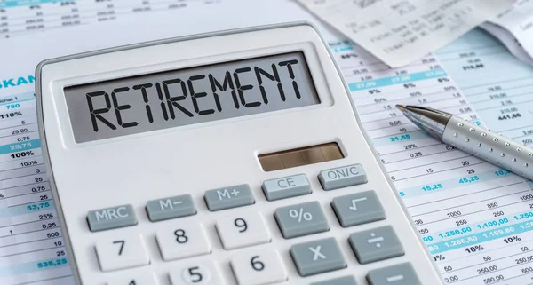 A calculator with the word Retirement on the display — Stock Photo, Image