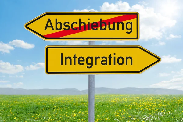 Two direction signs - Deportation or Integration- Abschiebung od — Stock Photo, Image