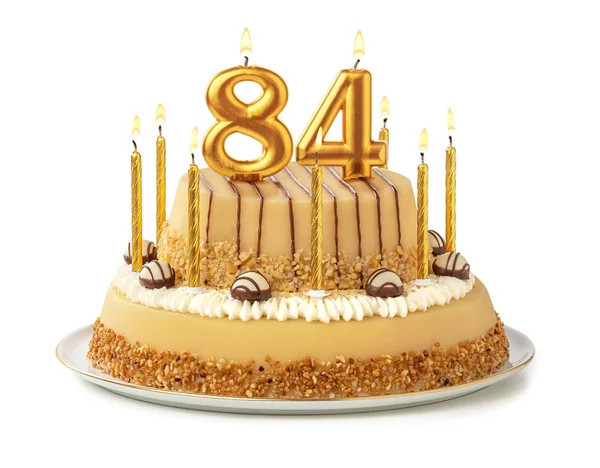 Pastel festivo con velas doradas - Número 84 — Foto de Stock