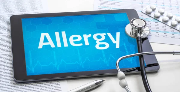 Das Wort Allergie auf dem Display eines Tablets — Stockfoto