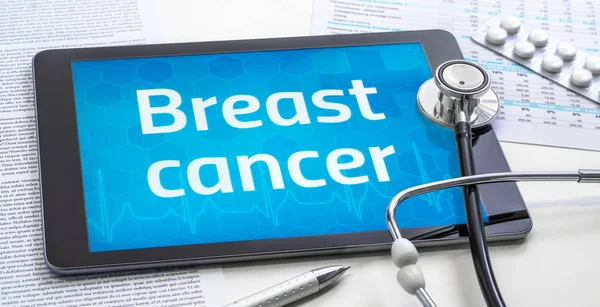 The word Breast cancer on the display of a tablet — Stock Photo, Image