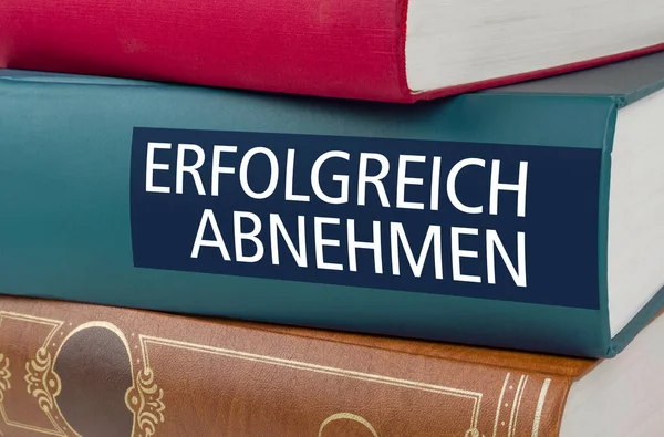 Ένα βιβλίο με τίτλο Πώς να χάσετε βάρος γρήγορα - Erfolgreich abn — Φωτογραφία Αρχείου