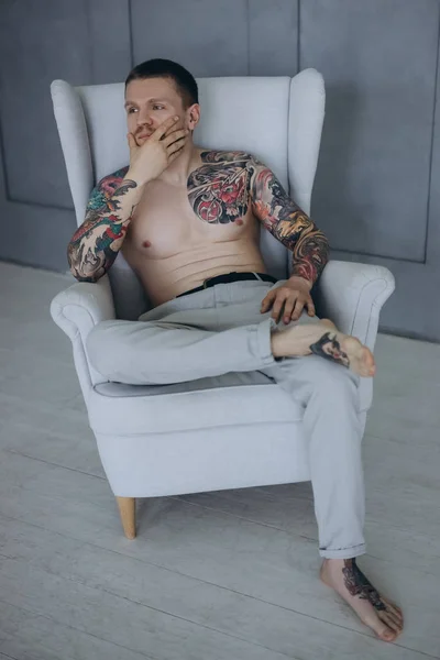 Shirtless Young Man Tattoos Sitting Armchair — Stock Photo, Image