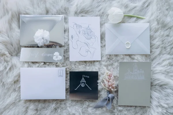 Top view of wedding invitations on furry carpet — Stock Photo