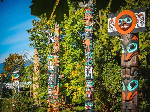 Colorful indian totems in stanley park vancouver canada