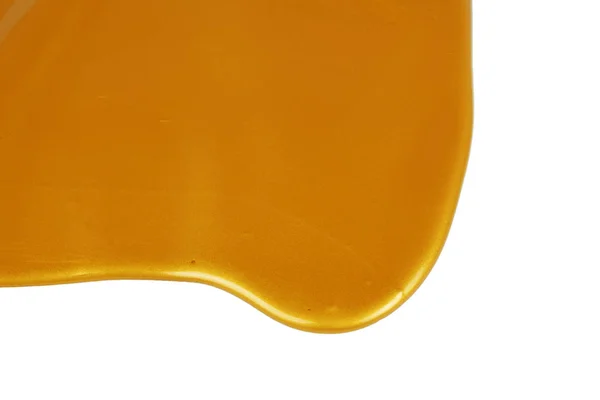 Droppande gyllene färg — Stockfoto