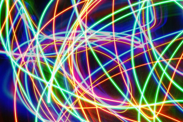 Abstraktní Pozadí Barevných Neonových Světel Zářící Čáry Tvořící Spletitou Pavučinu — Stock fotografie