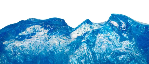 白色背景上孤立的蓝色透明冰形状 — 图库照片