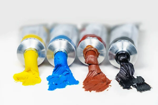 Set Opened Color Oil Paint Tubes White Surface Selective Focus — Stock Photo, Image