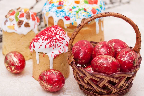 Easter basket with painted eggs, Easter Cakes, Bread, Kulich, Paska. Happy easter.