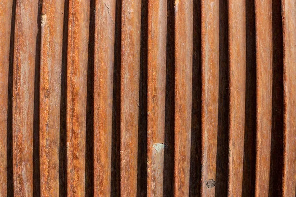 Abstract rusty weathered steel cable spool winch texture background.