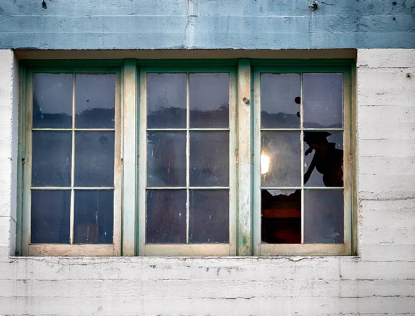 Old building window with panes and broken glass — Stock Photo, Image