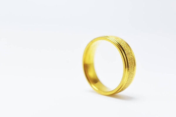 Golden wedding ring on white background,couple Love marry