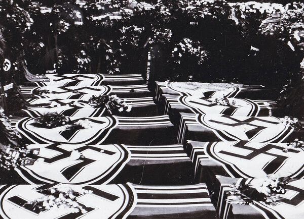 Coffins with saustica flags of dead German soldiers