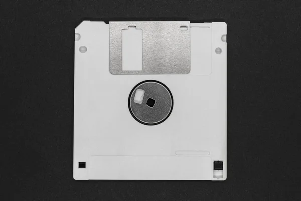 Disco floppy bianco su sfondo nero — Foto Stock