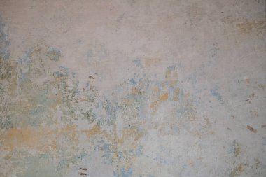 Soyut desenler ve tonlarda yıpranmış boya ile desenli yüzey