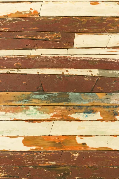 Weathered wooden boards wall. Painted hardwood. Rough wooden planks. Creative decotarion. Old wooden boards background. Grunge design wood.