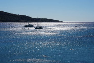 Voula 'da turkuaz deniz, Atina, gün batımı