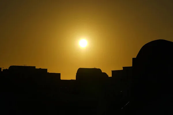 美丽的日落在古色古香的小镇伊亚 圣托里尼 — 图库照片