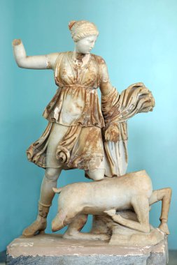 Statue of Artemis killing a deer, Delos island, Mykonos, Greece clipart