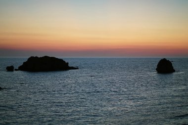 Prasoudi, Corfu 'da bir meyhanenin balkonundan güzel bir gün batımı görüldü.