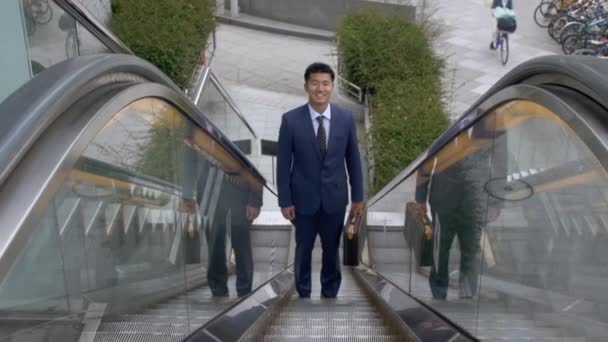 Japanese Business Man Using Outdoor Escalator — Stock Video