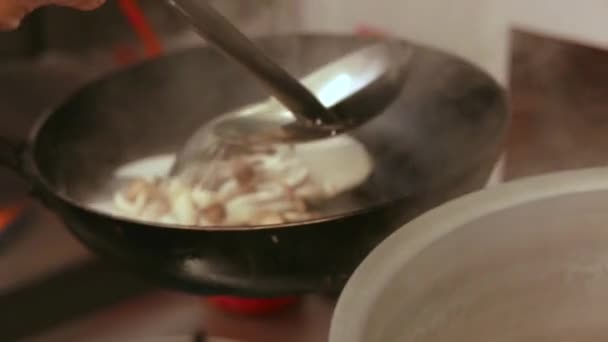 Woman Cooking Delicious Mushrooms Black Frying Pan — Stock Video
