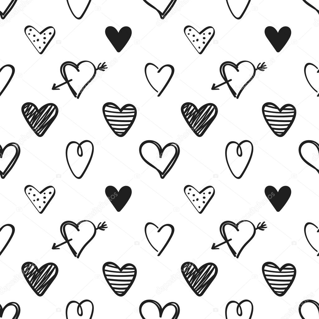 Seamless pattern with black hand drawn hearts