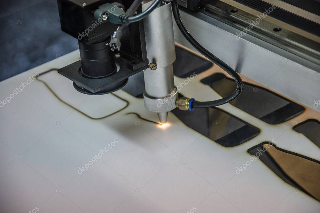 CNC Laser cutting machine. Cutting of wood and metal