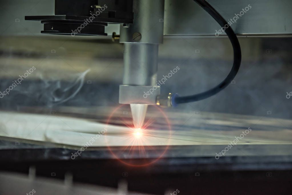 CNC Laser cutting machine. Cutting of wood and metal