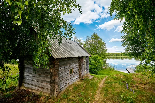 cabin in the Woods, on the banks of the River, next to the river