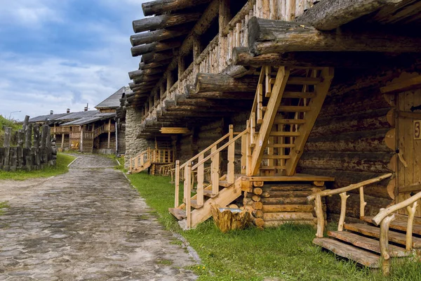 The general plan of the log house with a wooden road