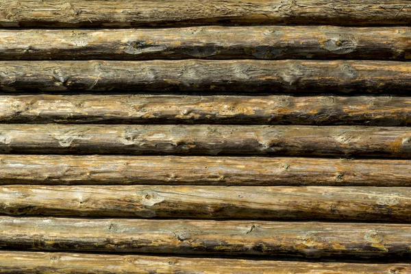 Achtergrond scherm in de vorm van een muur van logs — Stockfoto