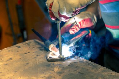 TIG kaynakçıları parlatılmış paslanmaz çelik kaplama için damızlık.