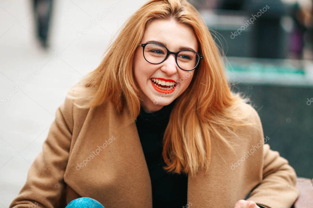 beautiful in girl smiling with glasses