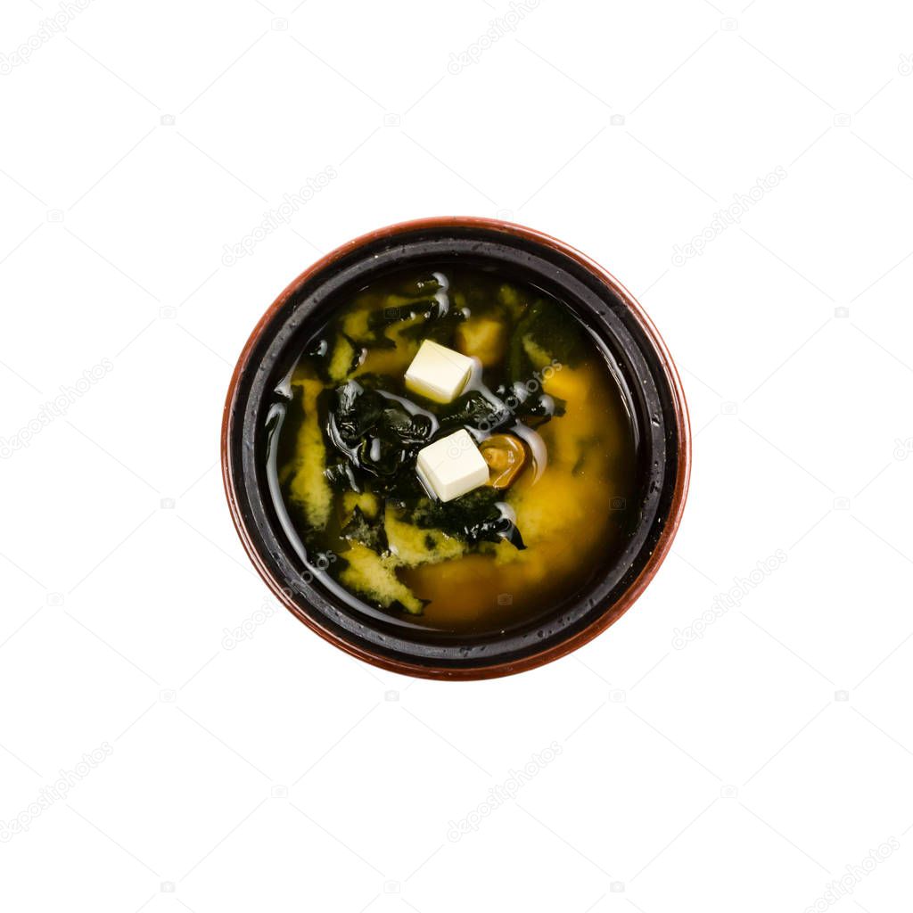 Miso soup in a  black cup isolated on white background. Isolated.