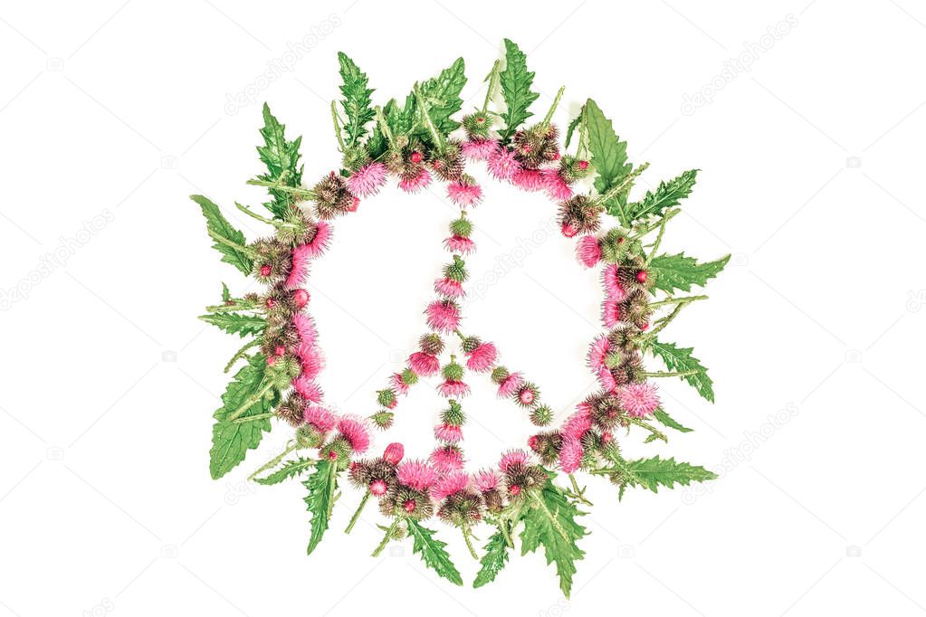 Peace sign (Pacific)-a symbol of peace, disarmament and anti-war movement, lined with leaves and delicate pink flowers blossomed Thistle.