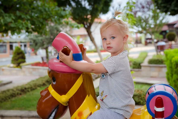 Little Cute Baby Girl Riding Amusement Park — Stock Photo, Image